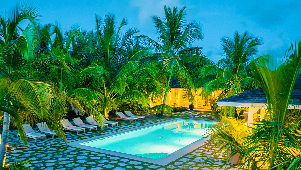 Luxury private villa rental vacation Bahamas pool at night